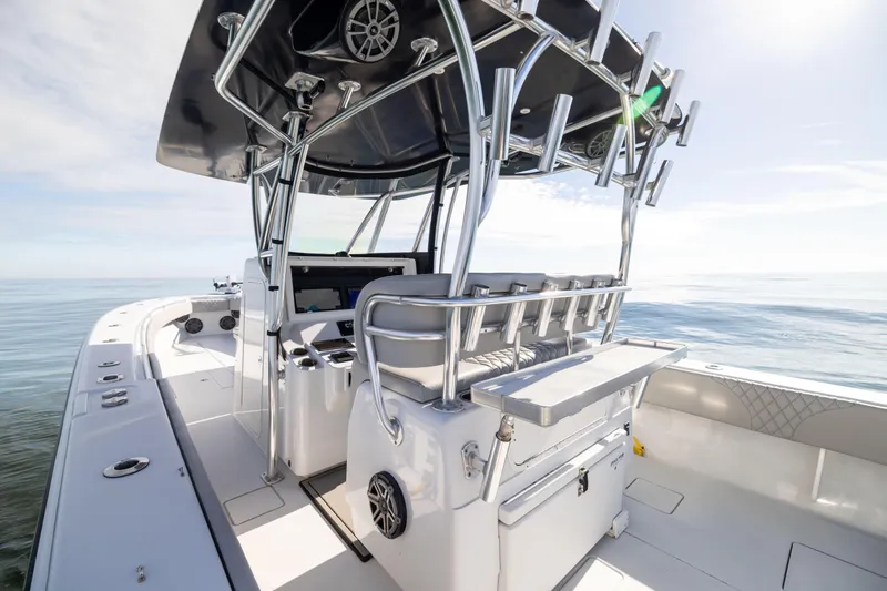  Yacht Photos Pics 2016 Contender 39 ST boat interior with sleek design and modern equipment on calm waters.