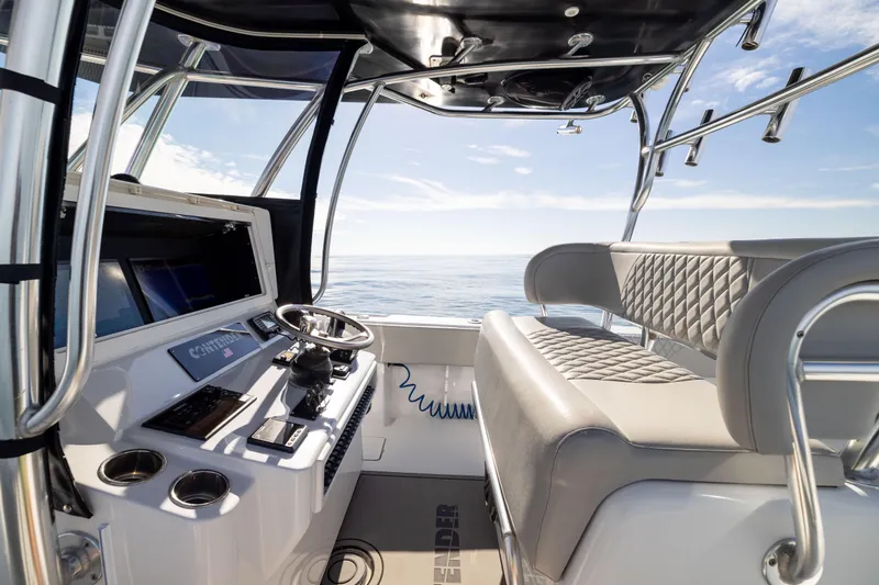  Yacht Photos Pics 2016 Contender 39 ST boat interior with helm, seating, and ocean view.