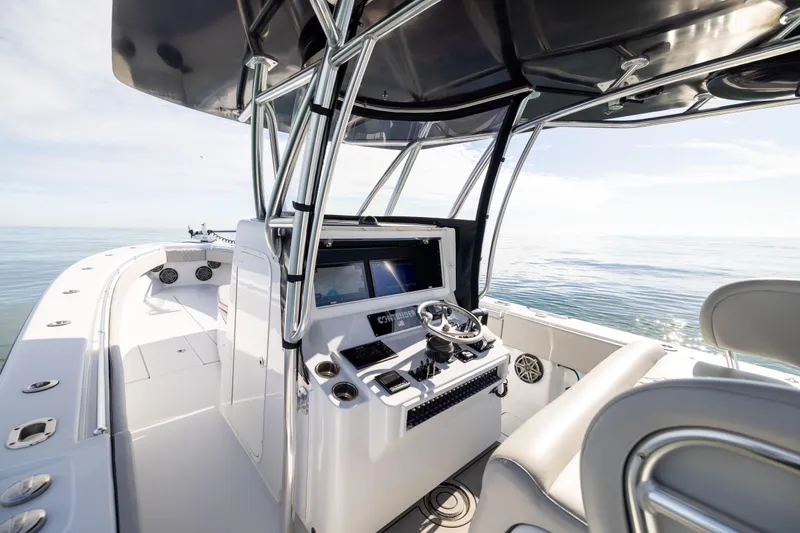  Yacht Photos Pics 2016 Contender 39 ST boat interior with helm, ocean view, and modern design.