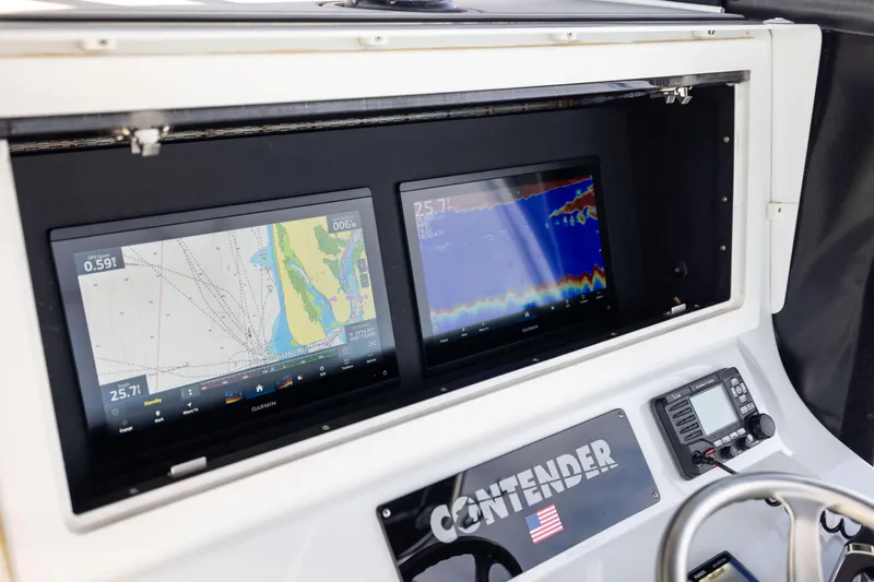  Yacht Photos Pics Dashboard of 2016 Contender 39 ST boat with dual Garmin navigation screens.