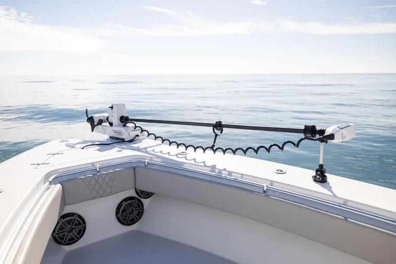  Yacht Photos Pics 2016 Contender 39 ST boat on calm ocean with trolling motor.