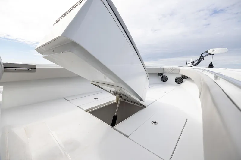  Yacht Photos Pics 2016 Contender 39 ST boat deck with open storage compartment.