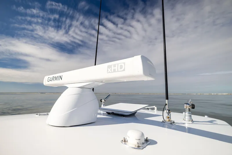  Yacht Photos Pics 2016 Contender 39 ST boat with Garmin xHD radar on calm water.