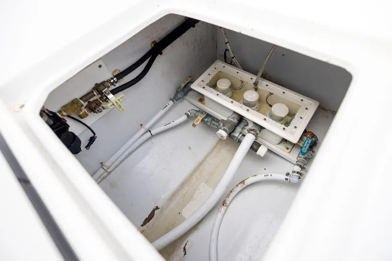  Yacht Photos Pics 2016 Contender 39 ST boat plumbing system with pipes and valves.