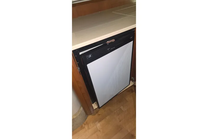 Lucky 13 Yacht Photos Pics Built-in refrigerator in 2009 Sea Ray Sundancer 350 yacht kitchen area.