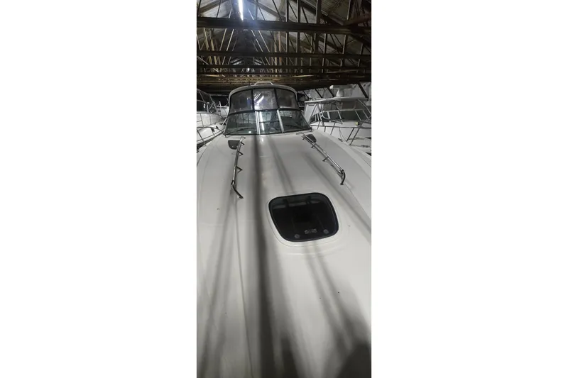 Lucky 13 Yacht Photos Pics 2009 Sea Ray Sundancer 350 yacht in storage, viewed from the bow.