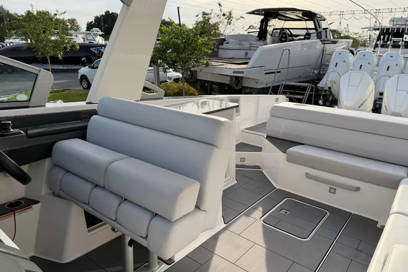  Yacht Photos Pics 2022 Aviara AV32 OB boat interior with modern seating and sleek design.