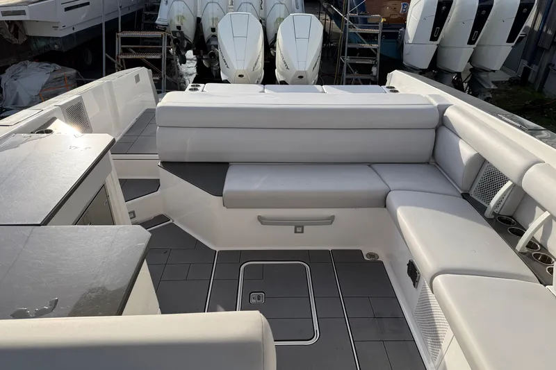  Yacht Photos Pics 2022 Aviara AV32 OB boat interior with sleek seating and modern design.