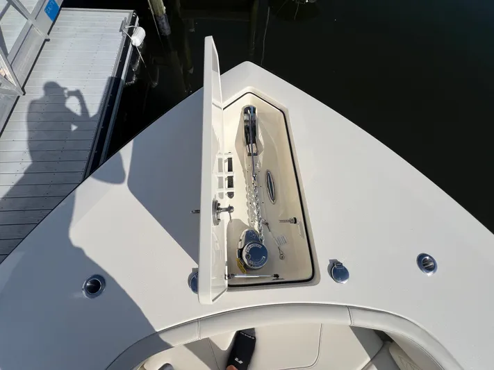  Yacht Photos Pics Bow of 2025 Scout 425 LXF with open anchor compartment, dockside view.