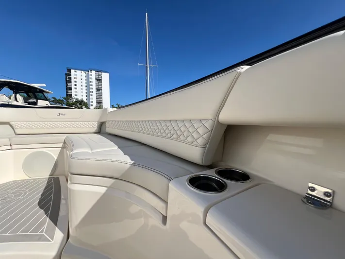  Yacht Photos Pics Luxurious interior of 2025 Scout 425 LXF boat with elegant seating and cup holders.