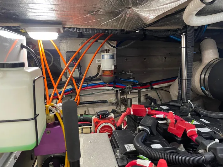 Covetime II Yacht Photos Pics Engine room of 2006 Sea Ray 44 Sedan Bridge with cables and batteries.