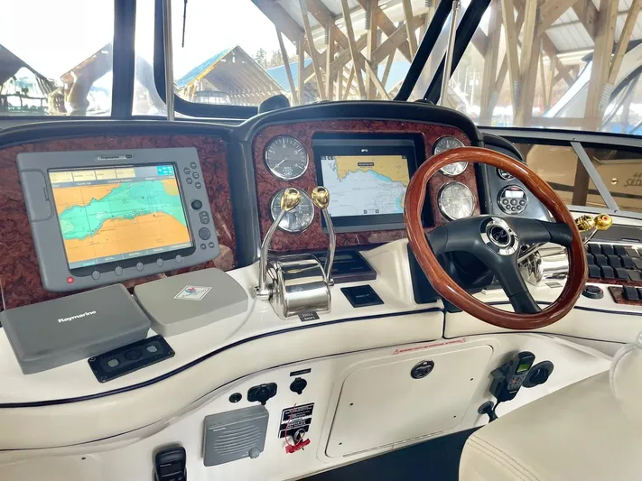 Covetime II Yacht Photos Pics Cockpit of 2006 Sea Ray 44 Sedan Bridge with navigation system.