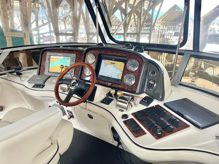 Covetime II Yacht Photos Pics 2006 Sea Ray 44 Sedan Bridge cockpit with navigation systems.