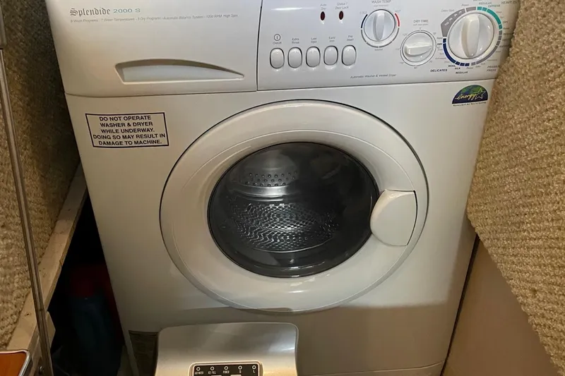 Covetime II Yacht Photos Pics Washing machine aboard 2006 Sea Ray 44 Sedan Bridge.