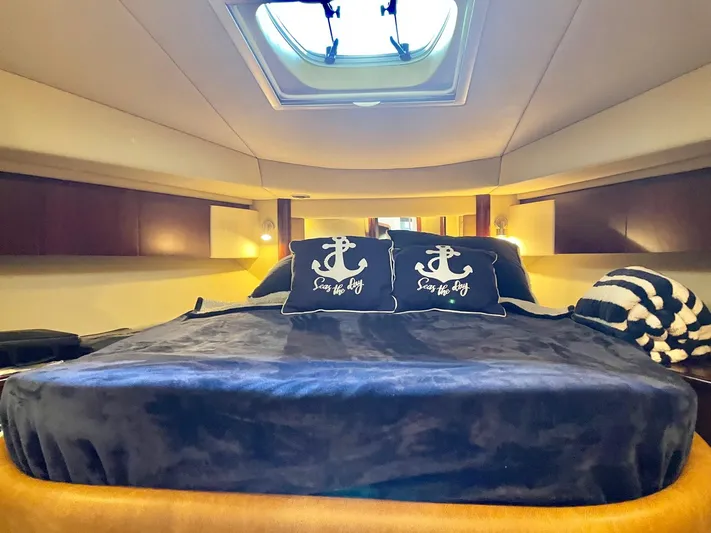 Covetime II Yacht Photos Pics Luxurious bedroom on a 2006 Sea Ray 44 Sedan Bridge yacht.