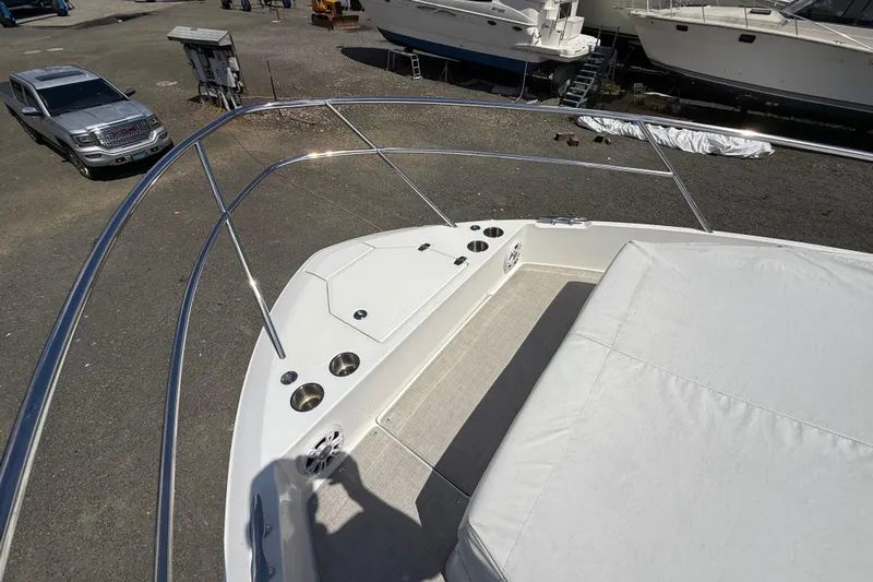  Yacht Photos Pics 2022 Regal 36 XO boat deck with seating and cup holders.