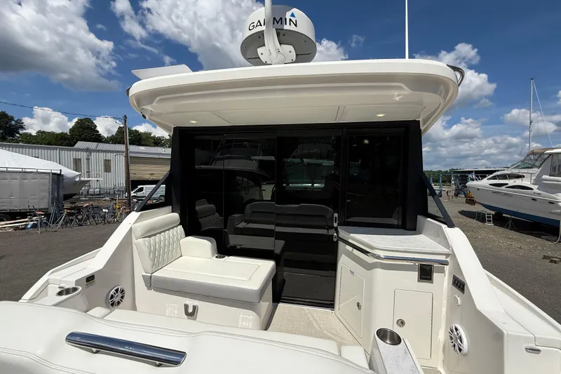  Yacht Photos Pics 2022 Regal 36 XO yacht with spacious seating and modern design.