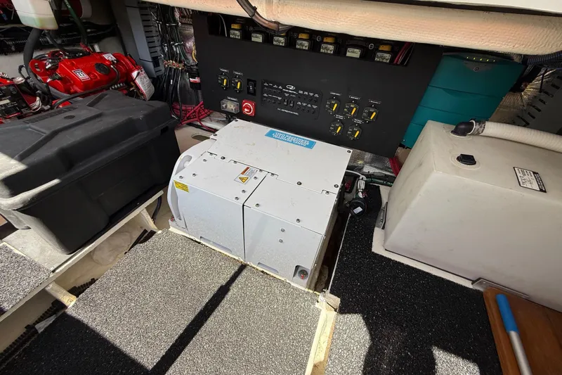  Yacht Photos Pics Engine room of 2022 Regal 36 XO boat with electrical components and equipment.