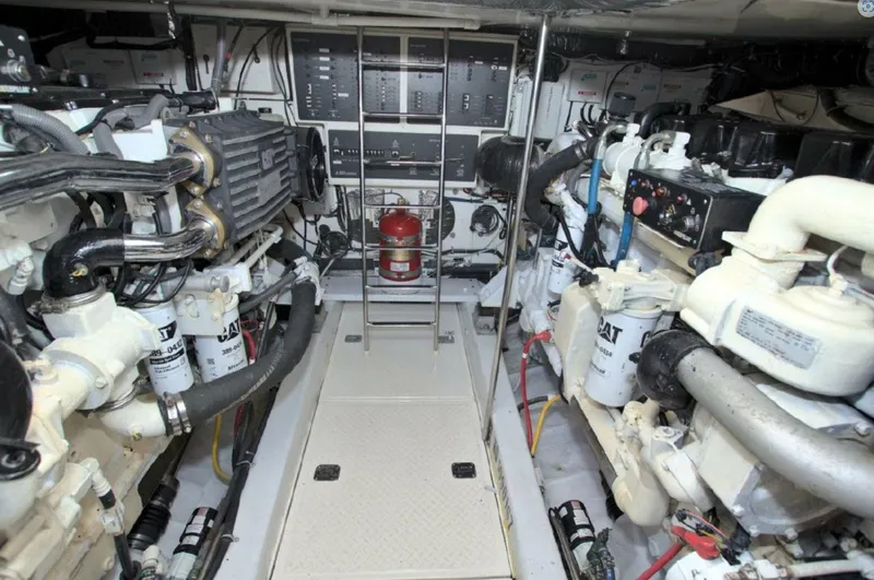 Sunshine Yacht Photos Pics Engine room of 2000 Tiara Yachts 5200 Express, showcasing machinery and equipment.