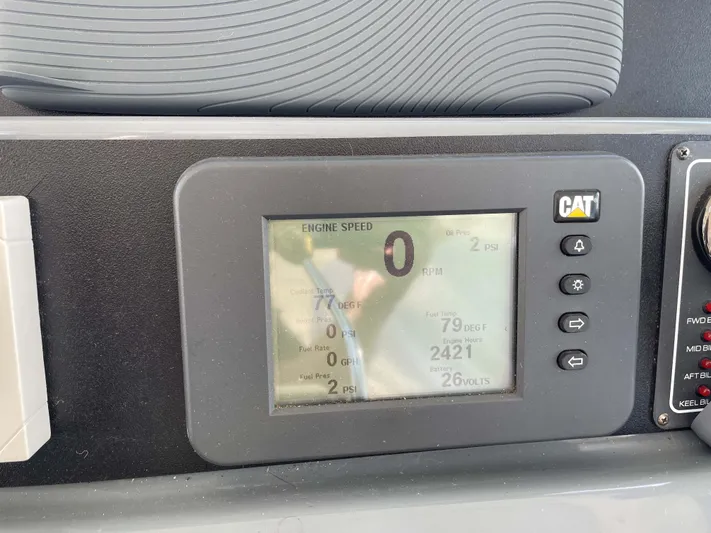 Sunshine Yacht Photos Pics Dashboard display of a 2000 Tiara Yachts 5200 Express showing engine speed and diagnostics.