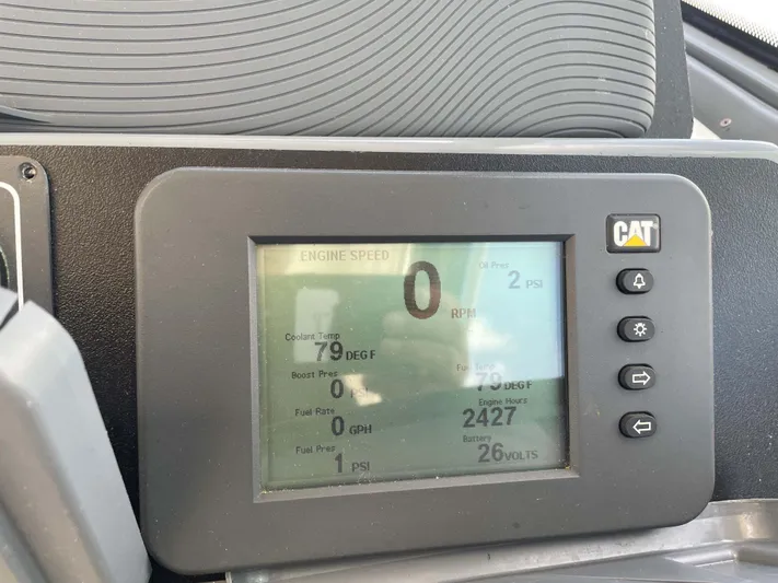 Sunshine Yacht Photos Pics Dashboard of a 2000 Tiara Yachts 5200 Express showing engine speed and diagnostics.