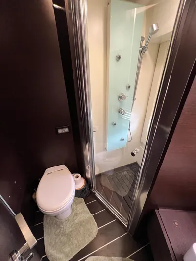  Yacht Photos Pics Bathroom interior of 2006 Azimut 86S yacht with shower and toilet.