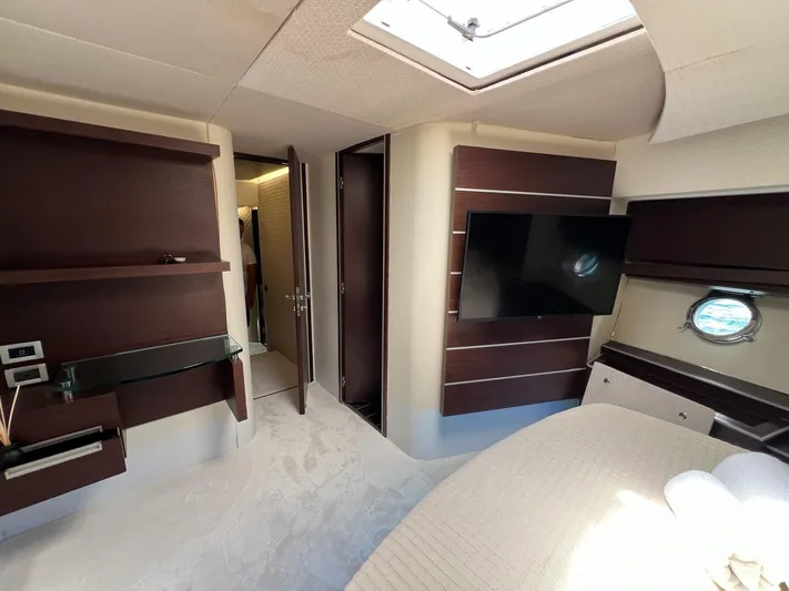  Yacht Photos Pics Luxurious interior of 2006 Azimut 86S yacht with modern furnishings and TV.
