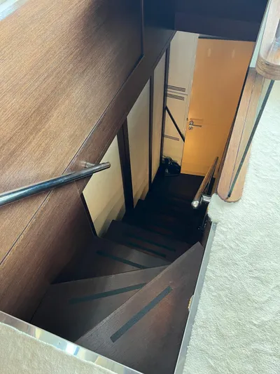  Yacht Photos Pics Staircase inside 2006 Azimut 86S yacht, featuring wooden steps and modern design.