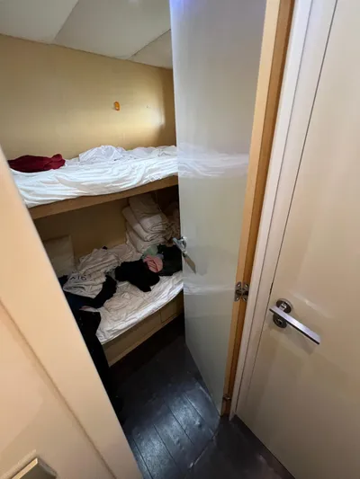  Yacht Photos Pics Bunk beds in a compact cabin on a 2006 Azimut 86S yacht.