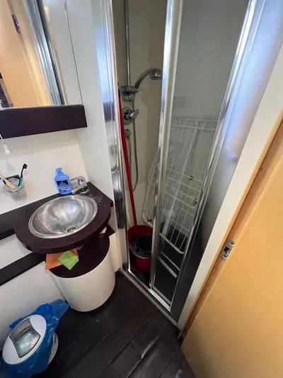  Yacht Photos Pics Bathroom interior of a 2006 Azimut 86S yacht with sink and shower.