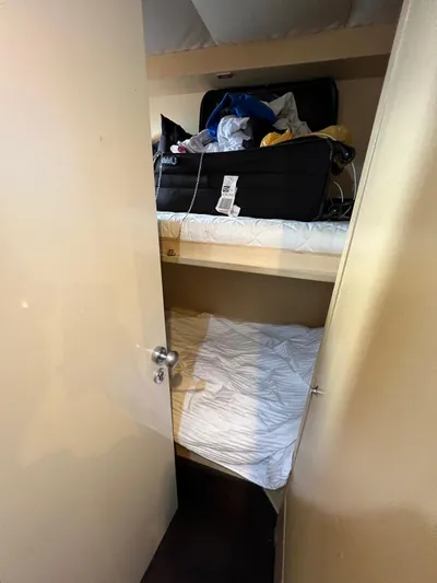  Yacht Photos Pics Small cabin with bunk beds and luggage on Azimut 86S yacht, 2006 model.