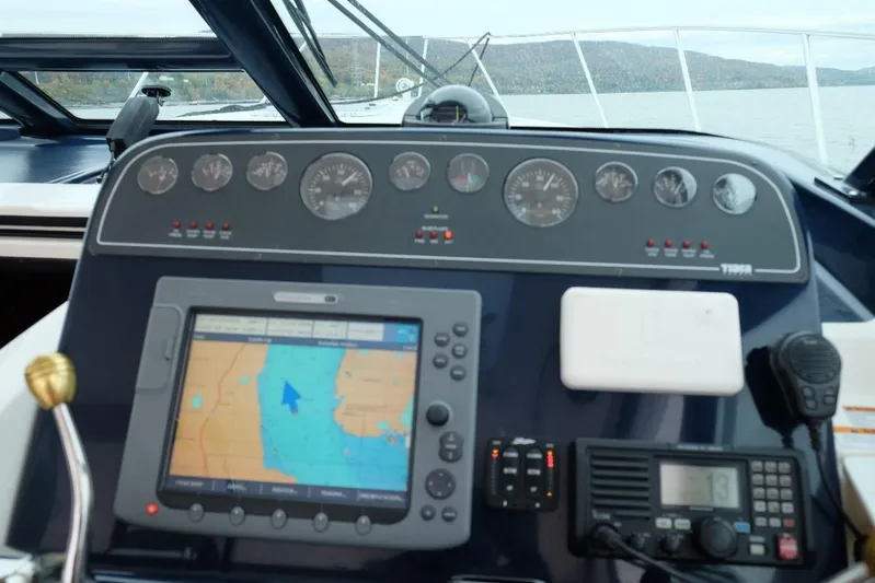  Yacht Photos Pics Dashboard of a 2006 Tiara Yachts 3200 Open, featuring navigation and communication equipment.