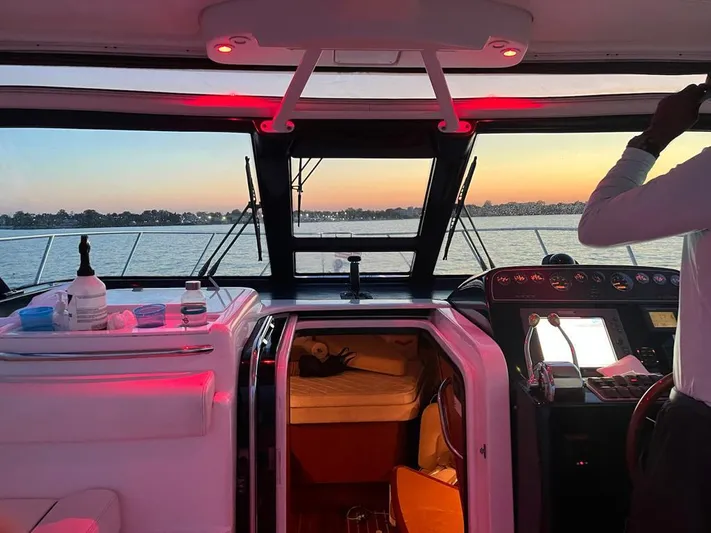  Yacht Photos Pics 2006 Tiara Yachts 3200 Open interior with sunset view through the windshield.