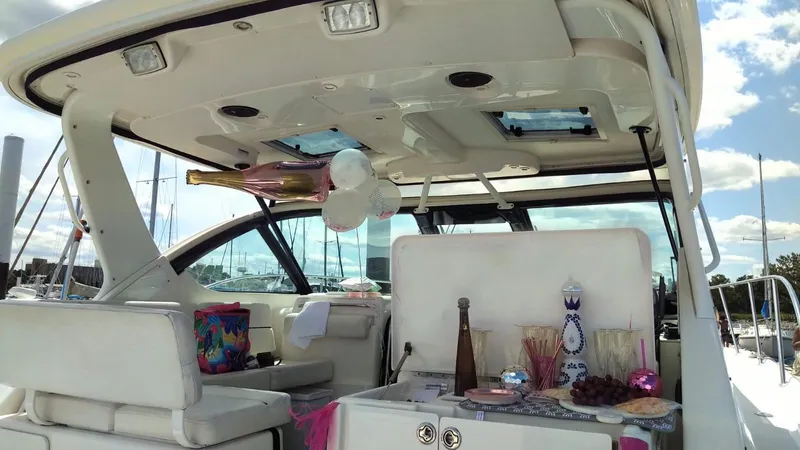  Yacht Photos Pics 2006 Tiara Yachts 3200 Open with party setup, balloons, and refreshments on deck.