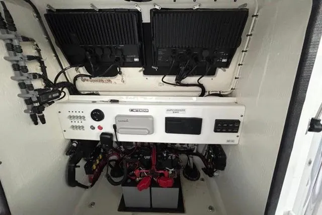  Yacht Photos Pics Electrical system of a 2025 Contender 26 Bay boat, featuring advanced wiring and components.