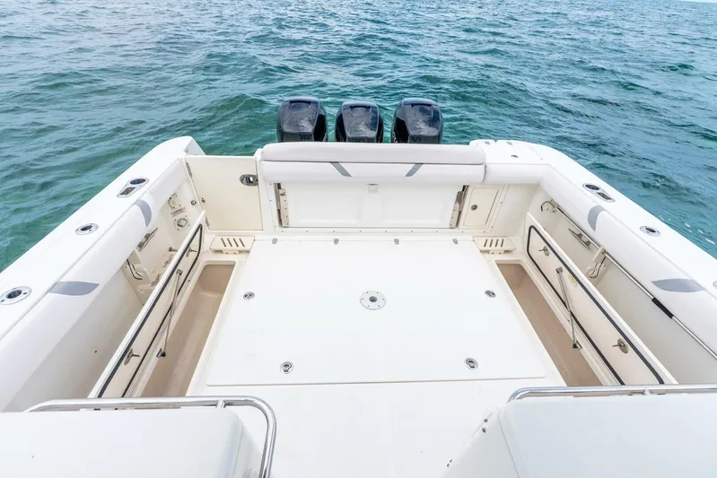 Reel Blessing Yacht Photos Pics 2012 Boston Whaler 345 Conquest boat deck with triple outboard motors.