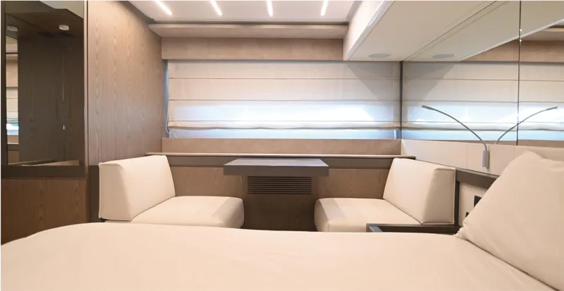  Yacht Photos Pics Luxurious interior of 2022 Ferretti Yachts 550 with modern seating and elegant design.
