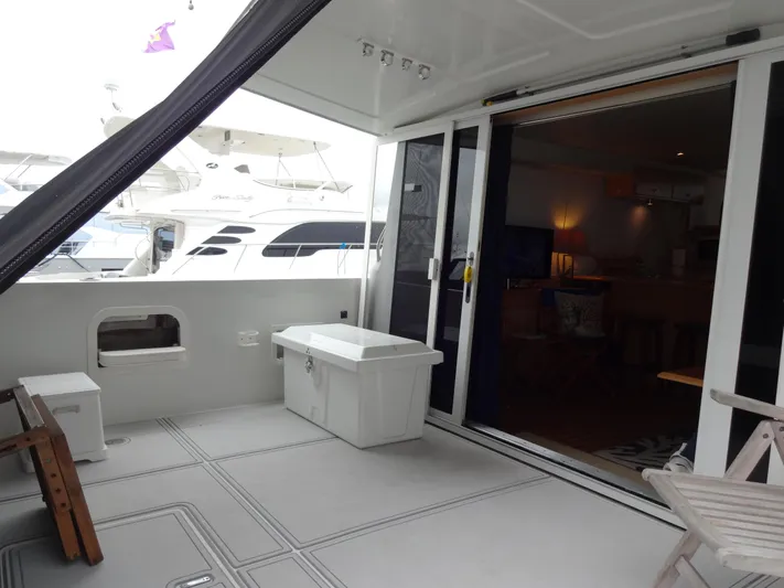 Gypsy Soul Yacht Photos Pics 1998 Navigator 53 Classic yacht interior with open deck and sliding glass doors.