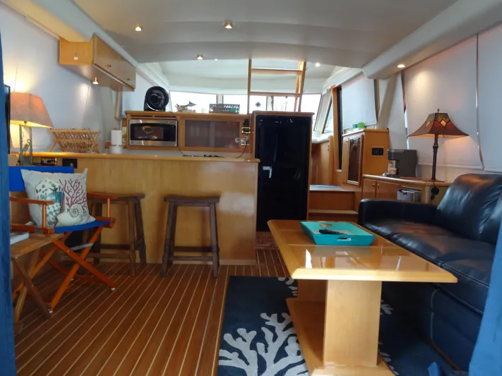 Gypsy Soul Yacht Photos Pics Interior of 1998 Navigator 53 Classic yacht with cozy seating and modern amenities.