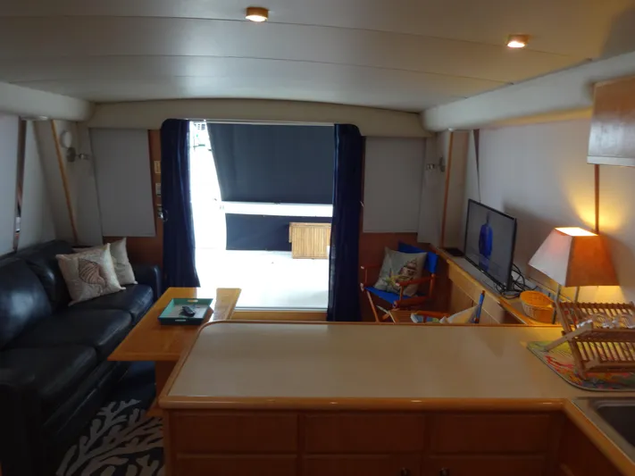 Gypsy Soul Yacht Photos Pics Interior of 1998 Navigator 53 Classic yacht with cozy seating and modern amenities.
