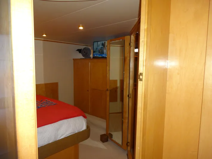 Gypsy Soul Yacht Photos Pics Cozy bedroom interior on 1998 Navigator 53 Classic yacht with wooden furnishings.
