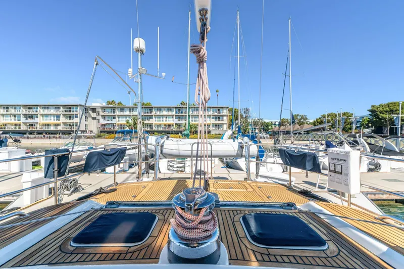 Perfect Symmetry Yacht Photos Pics Hylas 70 yacht deck view, marina background, clear blue sky, 2006 model.