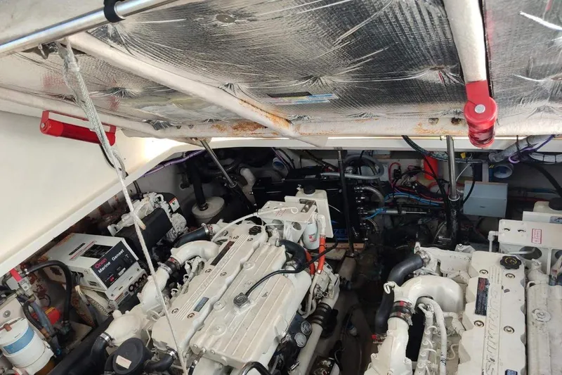  Yacht Photos Pics Engine room of a 2005 Sea Ray 425 Sundancer with visible machinery and components.