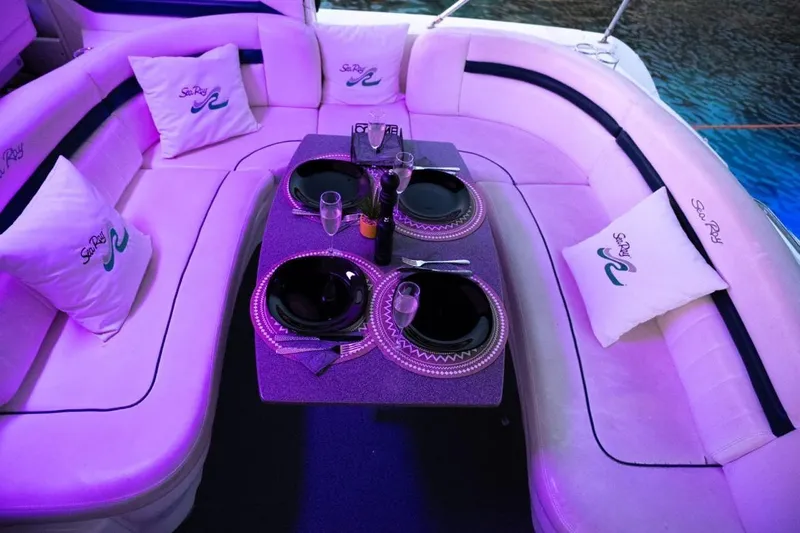  Yacht Photos Pics Luxurious 2005 Sea Ray 425 Sundancer yacht interior with elegant dining setup and ambient lighting.