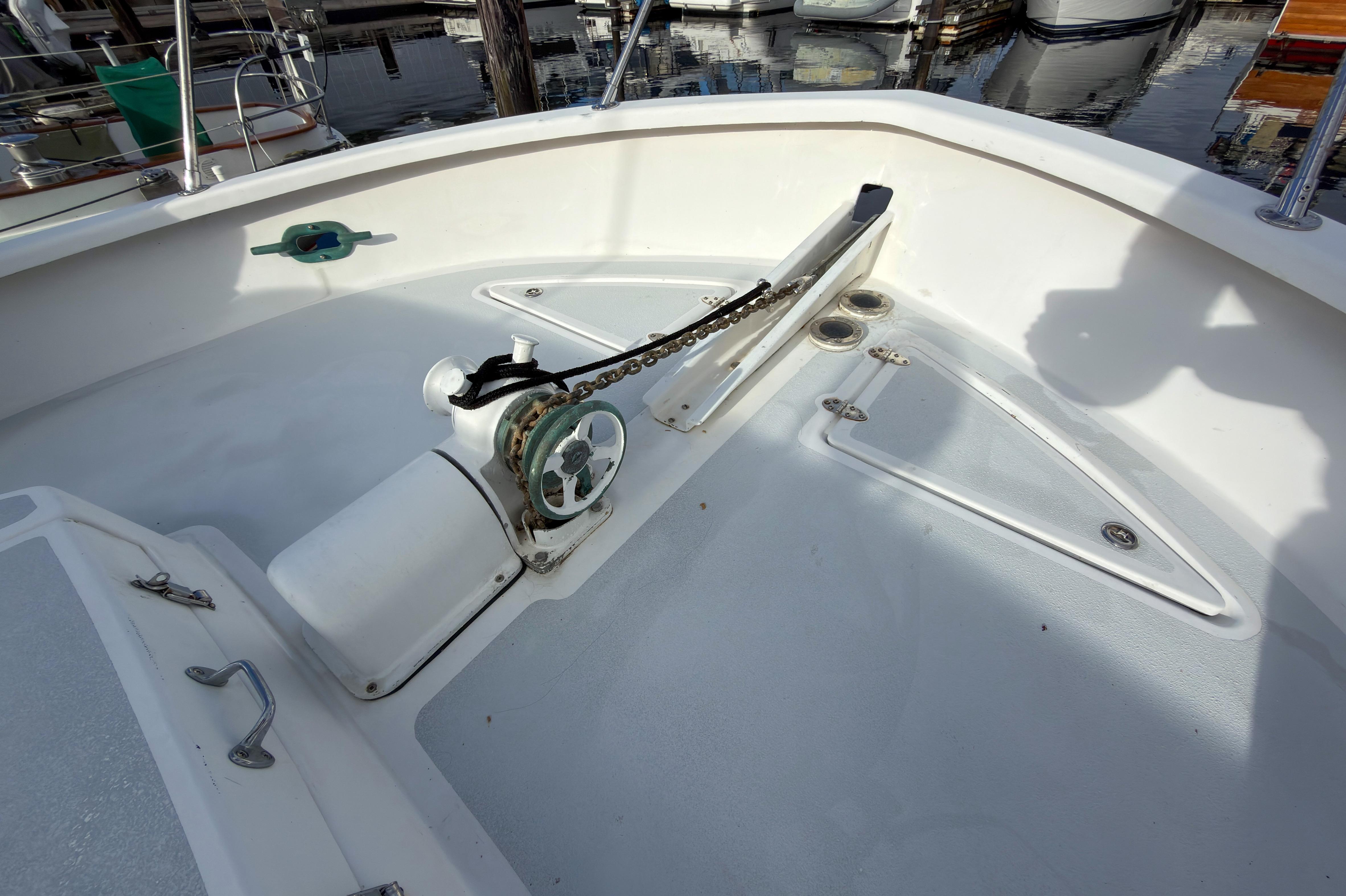 2014 Farrell 34 Pilothouse boat deck with anchor chain and winch system.