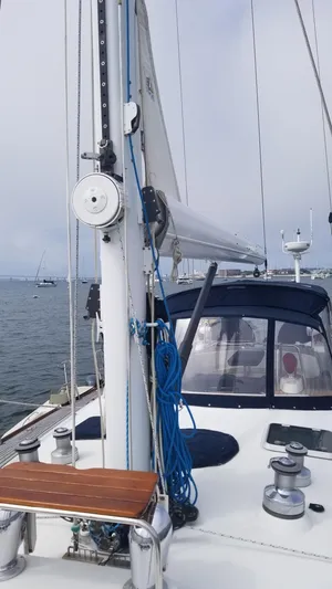  Yacht Photos Pics Sailing yacht CNB 64, 2003 model, docked with visible mast and deck equipment.