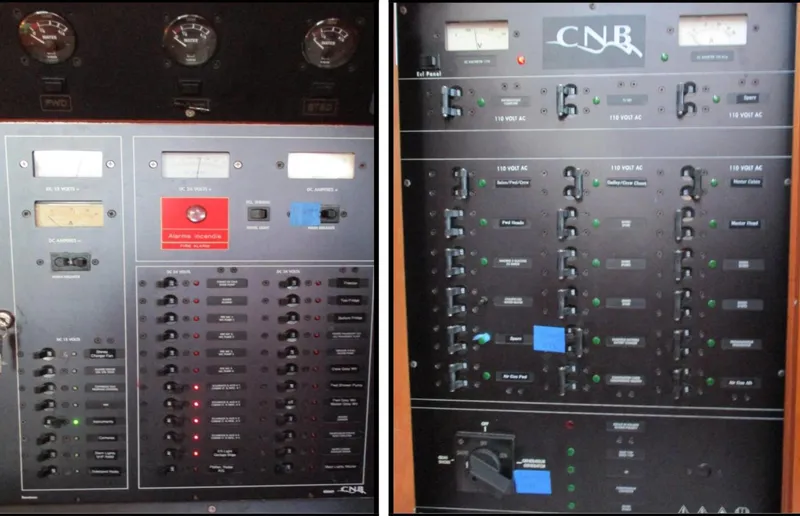  Yacht Photos Pics Electrical control panels on a 2003 CNB 64 yacht, featuring gauges and switches.