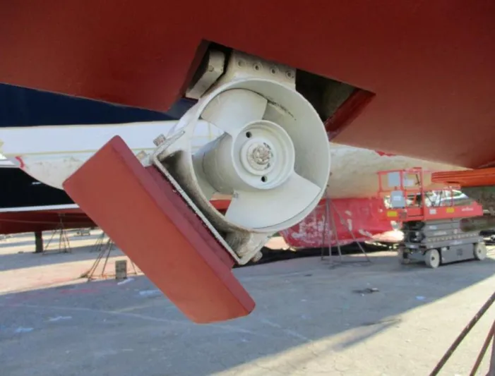  Yacht Photos Pics Bow thruster of 2003 CNB 64 yacht in dry dock, close-up view.