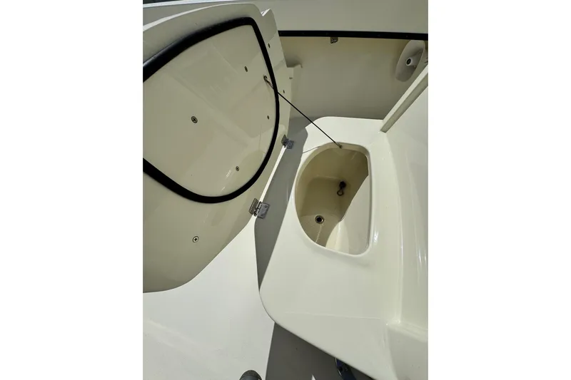  Yacht Photos Pics Open storage compartment on 2018 Young Boats 27 model.