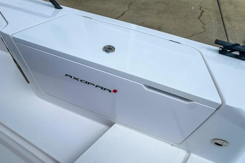  Yacht Photos Pics Axopar 37 Sun-Top 2022 boat detail with sleek white design and logo.